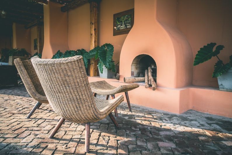 Cozy Patio - two brown wicker chairs