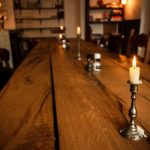 Flooring Options - shallow focus photo of lighted white pillar candle