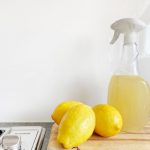 Eco Cleaning - yellow lemon fruit beside clear glass bottle