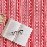 Seasonal Cleaning - flat lay photography of eyeglasses on opened book